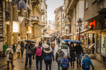 Nightime on Vaci Utca the main shopping street in Budapest, Hungary decorated for the holidays .のeditorial素材