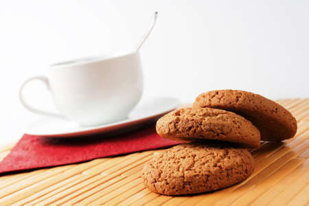 cup of coffee and oatmeal cookiesの写真素材