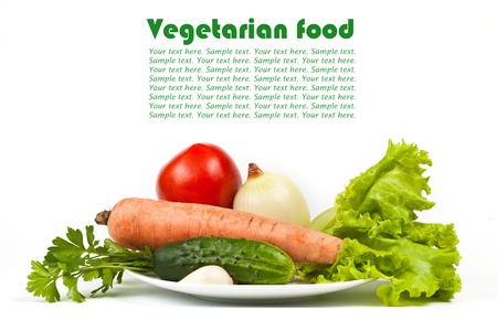 Fresh raw vegetables in plate isolated on white backgroundの写真素材