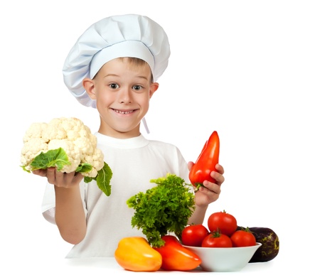 cook is holding cauliflower and bell pepperの写真素材