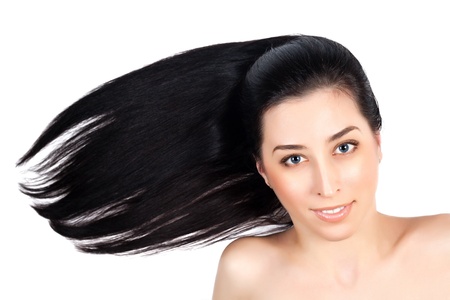 Beautiful woman with long brown straight hairs の写真素材