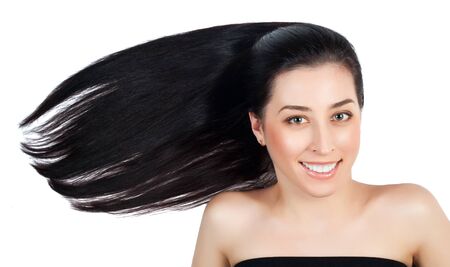 attractive woman with long brown straight hairsの写真素材