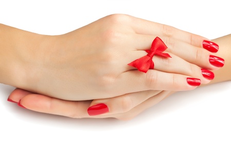 Relaxing Hands with red manicure isolatedの写真素材