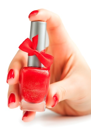 Hands with red nail polish isolatedの写真素材