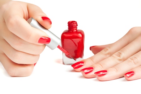 manicure  applying nail polish  isolatedの写真素材