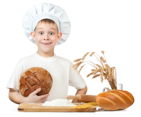 little scullion is kneading dough  isolatedの写真素材