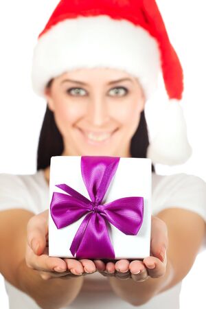 happy woman in a Santa Claus hat with giftの写真素材