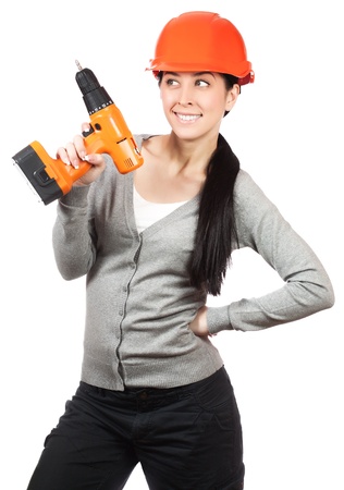 pretty woman with hard hat and screwdriver  isolatedの写真素材