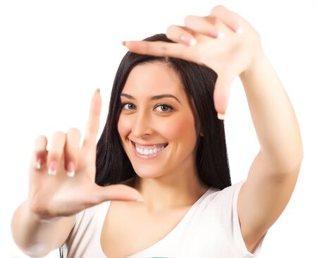 girl making a frame with her hands  isolatedの写真素材