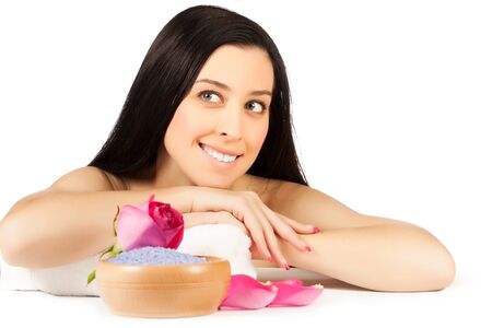 beautiful brunette is relaxing in the spa  isolatedの写真素材