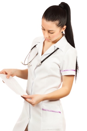 woman doctor is looking cardiogram. on whiteの写真素材