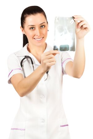 woman doctor is looking roentgenogram. isolatedの写真素材