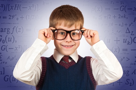 small kid prodigy on the formulas backgroundの写真素材