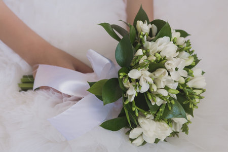 bridal bouquet  in the the bride s hands