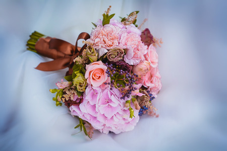 wedding bouquet of flowers and wedding dressの写真素材