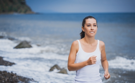 cute athlete on morning jogの写真素材