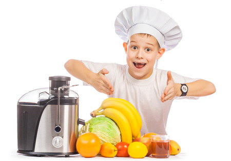 happy Scullion is pressing the juice from the fruit. isolatedの写真素材