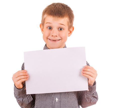 cute boy with white sheet of paperの写真素材