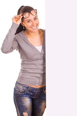 cute woman holding a banner isolatedの写真素材