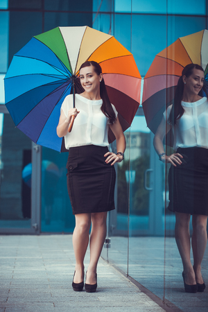 Business woman walking outside in city. office worker in downtown.の写真素材