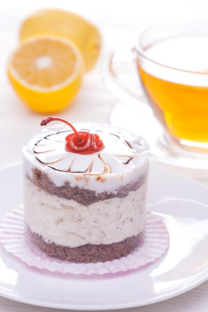 Delicious of Green tea mousse cake on wooden tableの写真素材