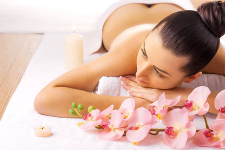 beautiful woman in a massage salonの写真素材