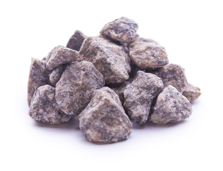 Pile of multiple granite stones isolated over the white backgroundの写真素材