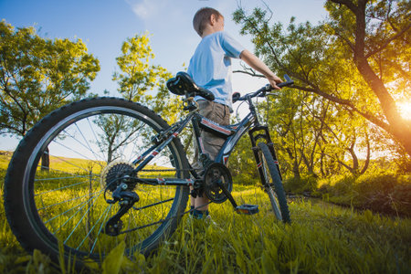 happy funny kid on bicycle. Active Leisureの写真素材