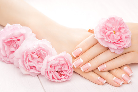 french manicure with rose flowers. spaの写真素材