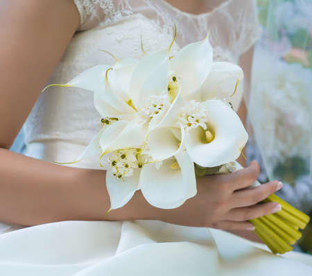 kala wedding bouquet in bride's handsの写真素材