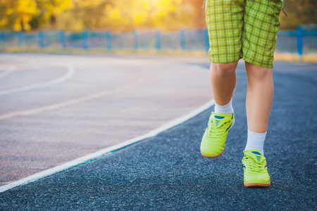 Runner's Feet Running on Stadium. Closeup - outdoor shotの写真素材