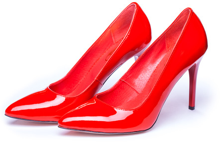 Women's red shoes isolated on white backgroundの写真素材