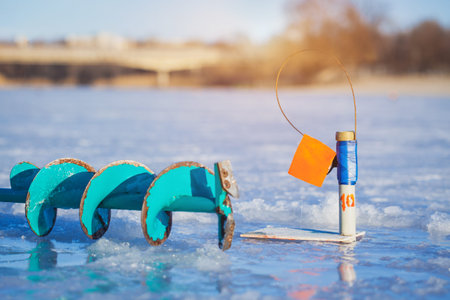 Ice Fishing on the winter Lake