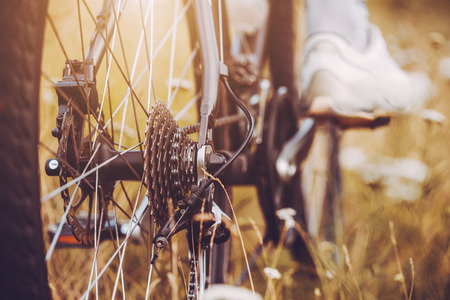 Rear racing bike cassette on the wheel with chain and footの写真素材