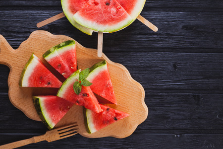 Top view healthy watermelon on the wooden background.の写真素材