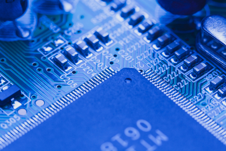 close up computer microchip integrated on motherboardの写真素材