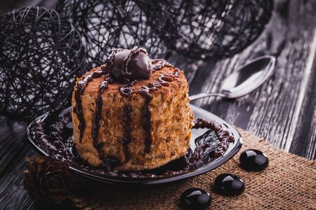 homemade Chocolate cake on the black wooden tableの写真素材