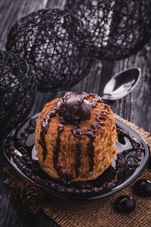 homemade Chocolate cake on the black wooden tableの写真素材