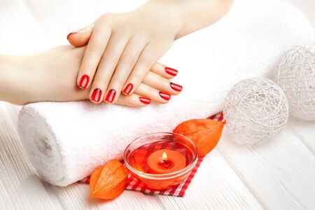 red manicure with dekor. spaの写真素材