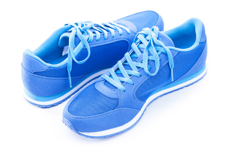 Pair of blue sport shoes isolated on the white backgroundの写真素材