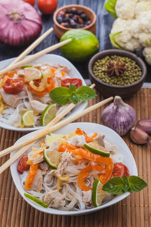 delicious Korean rice noodles with chicken.の写真素材