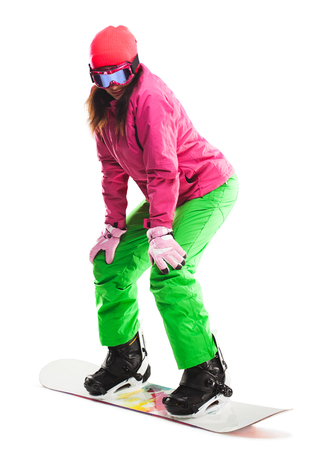 Girl with snowboard in studio on isolated background.の写真素材