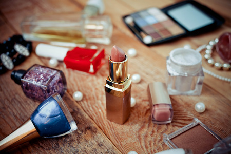 Various makeup products on wooden backgroundの写真素材