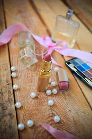 Makeup products on wooden backgroundの写真素材