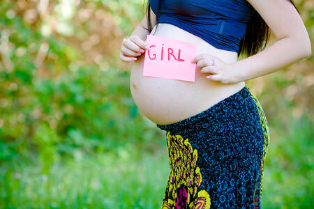 pregnant woman relaxing in the seaの写真素材