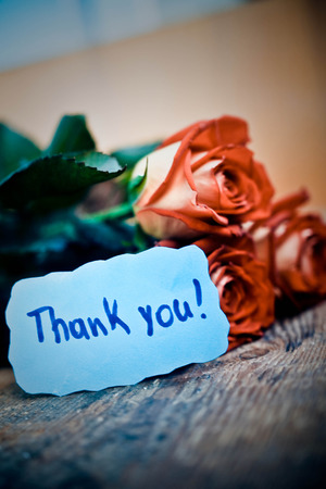 Thank you card and red rosesの写真素材