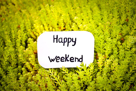 Card with the text of happy weekend off on a green backgroundの写真素材