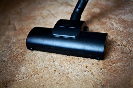 Vacuum cleaner to tidy up the living roomの写真素材