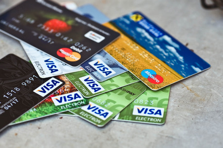 KIEV UKRAINE on June 15: Heap of credit cards Visas and MasterCard Ukraine on june 15 2015.Pile of Visa credit cards. Visa and master card is biggest credit card.のeditorial素材