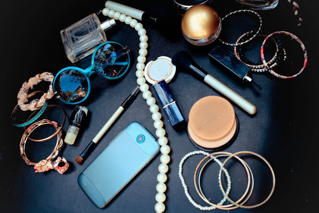 Fashionable female accessories on a black backgroundの写真素材